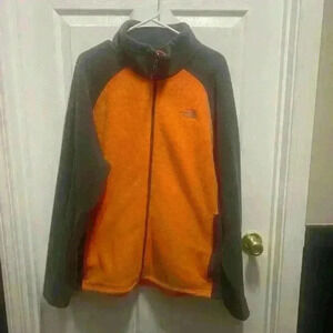 The North Face - orange and gray fleece jacket